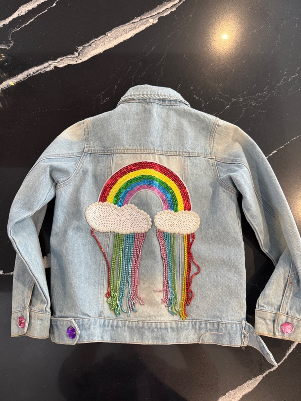 Lola + The Boys Light Blue Denim Jacket with Rainbow Sequin Back Patch